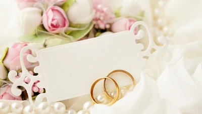 Elegant Wedding Anniversary Celebration with Floral Accents and Gold Rings