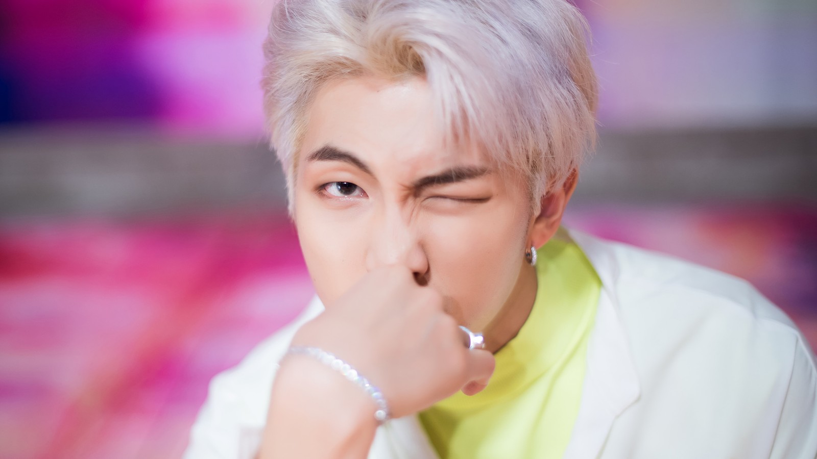 A close up of a person with a finger on their nose (rm, kim nam joon, bts, bangtan boys, kpop)