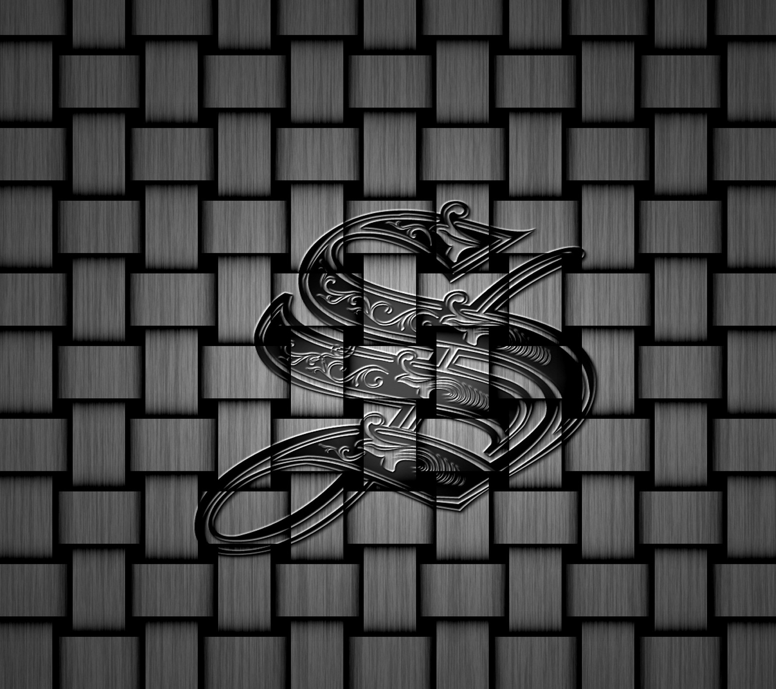 A black and white photo of a snake on a metal background (black, grey letter s)