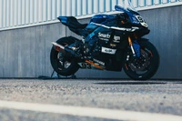 Moto de course Yamaha Superbike avec jantes élégantes et système d'échappement