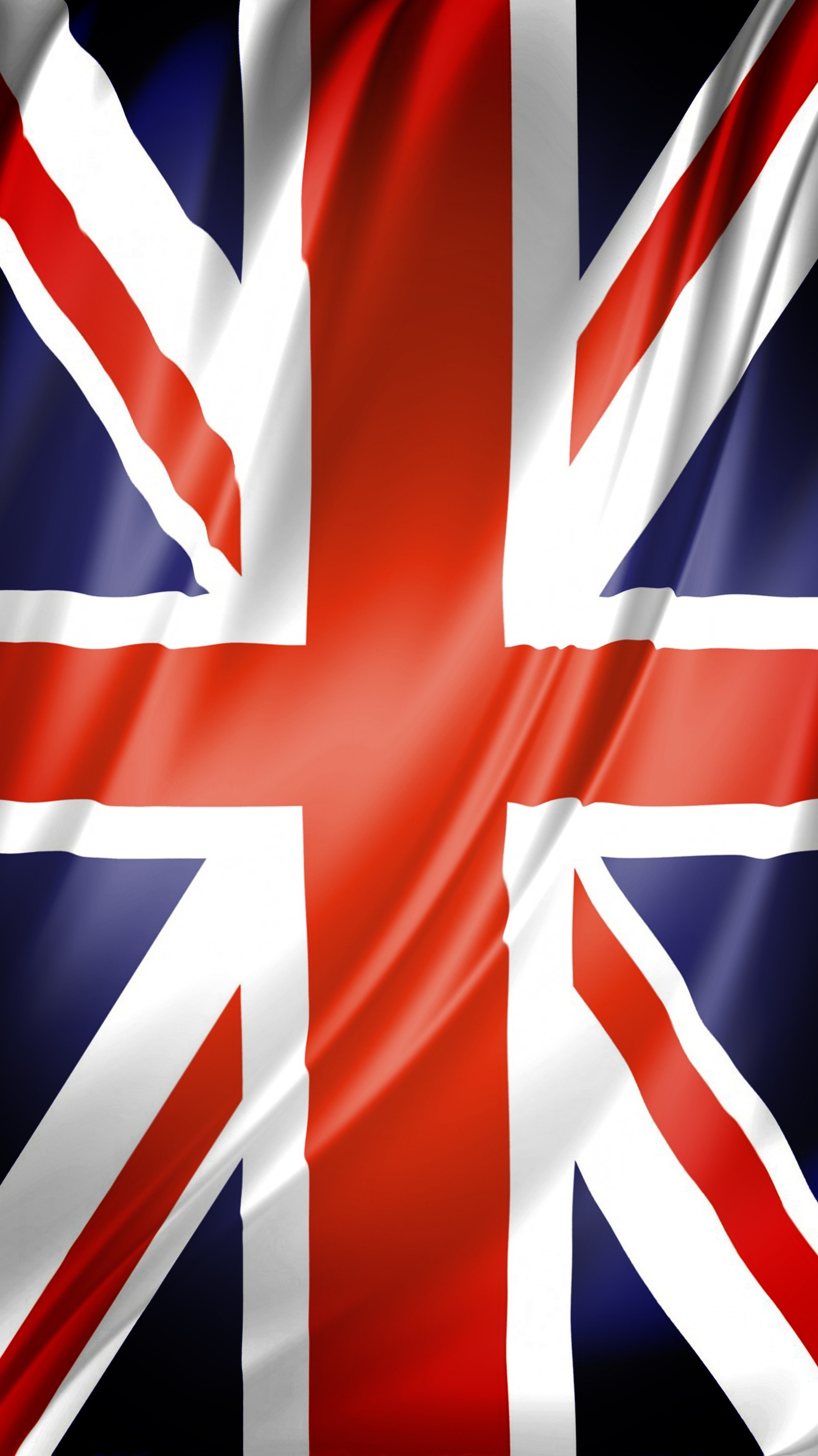 A close up of a british flag with a black background (flags, uk flag)