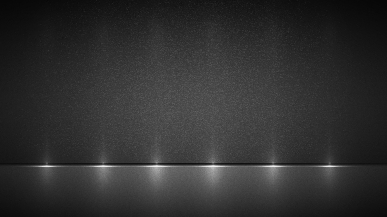 A black and white photo of a row of lights on a wall (black, edge, gray, lines, pure)