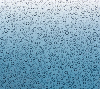 Close-up de gotas de chuva em uma superfície de vidro