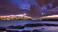 Le port de Sydney au crépuscule : une ville illuminée époustouflante