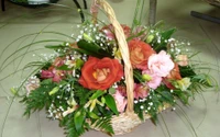 Elegant Floral Arrangement in a Woven Basket with Garden Roses and Delicate Accents