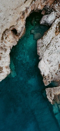 Azure Waters Flowing Through Rocky Outcrops