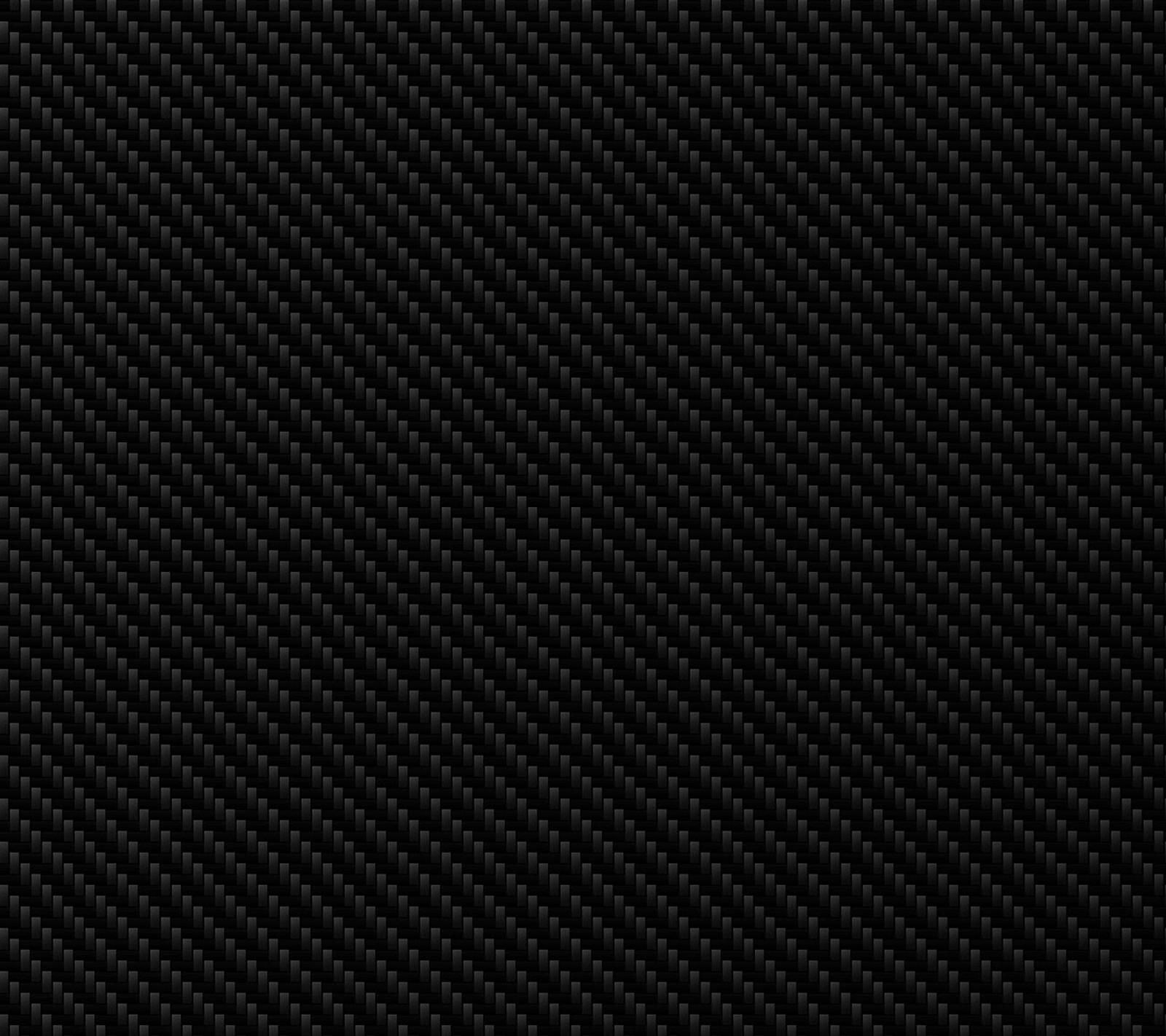 A close up of a black carbon fiber texture (carbon, fiber, fibre, pattern, texture)