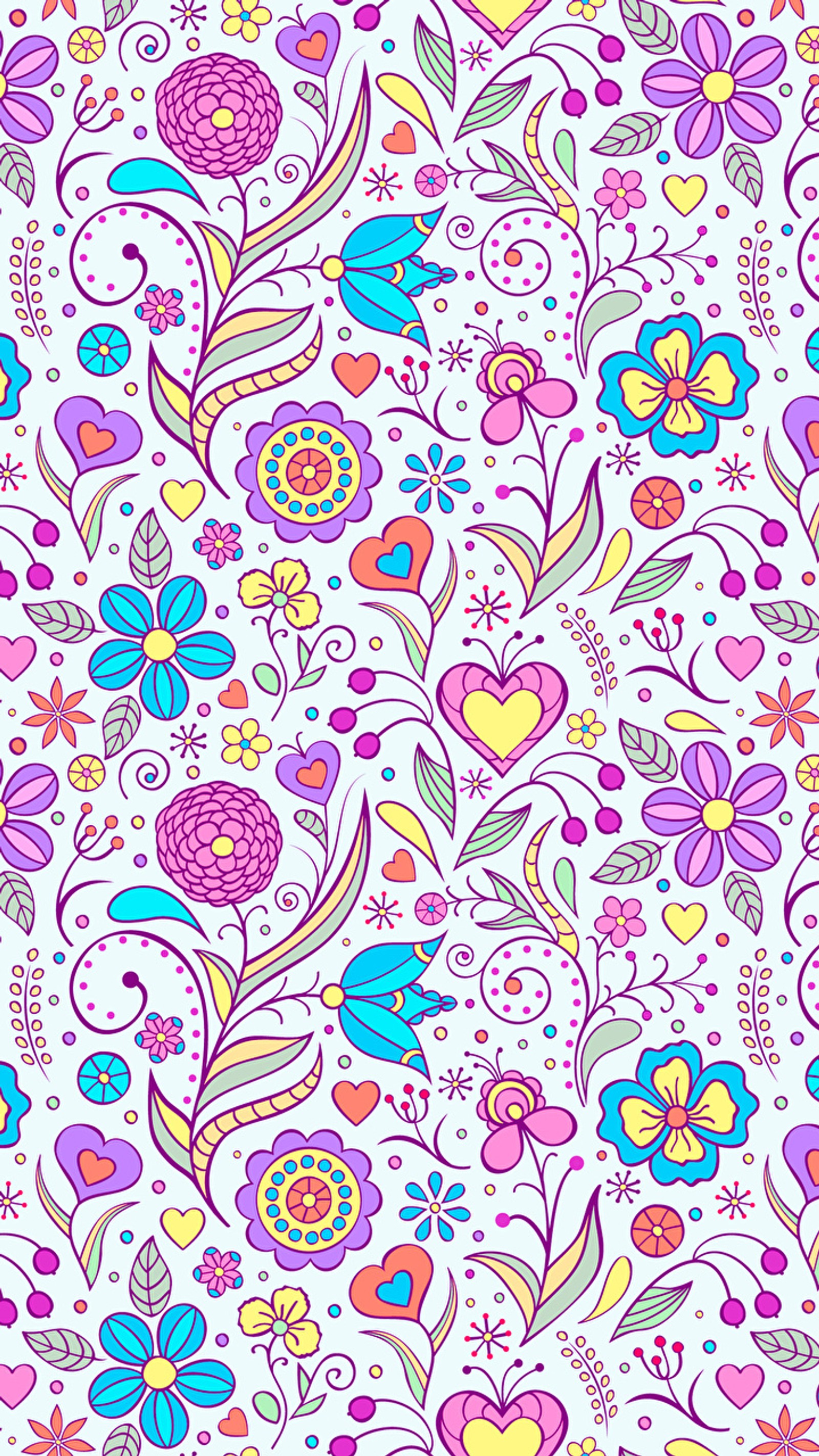 Um close-up de um padrão floral colorido com corações e flores (fundo, flores, amor, textura)