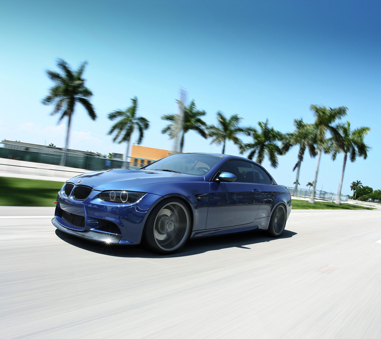 Arafed view of a blue bmw car driving down a road (blue, bmw, m3)