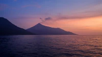 Tranquil Sunset Over a Volcanic Horizon