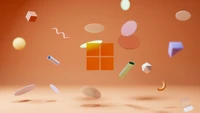 Logo dynamique de Windows 11 entouré de formes flottantes colorées sur un fond orange