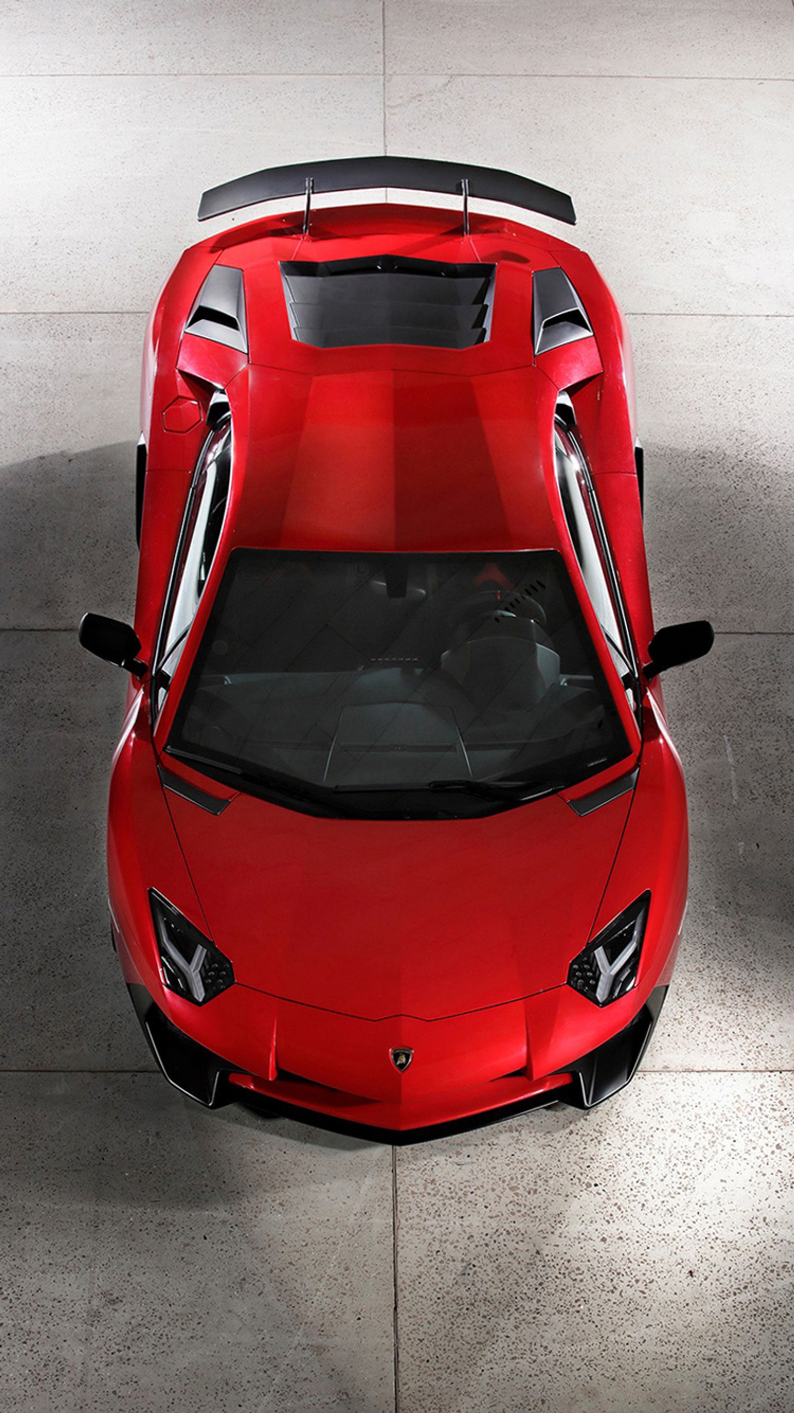 A close up of a red sports car parked in a parking lot (aventador, lamborghini, lp 750 4, red, supercar)