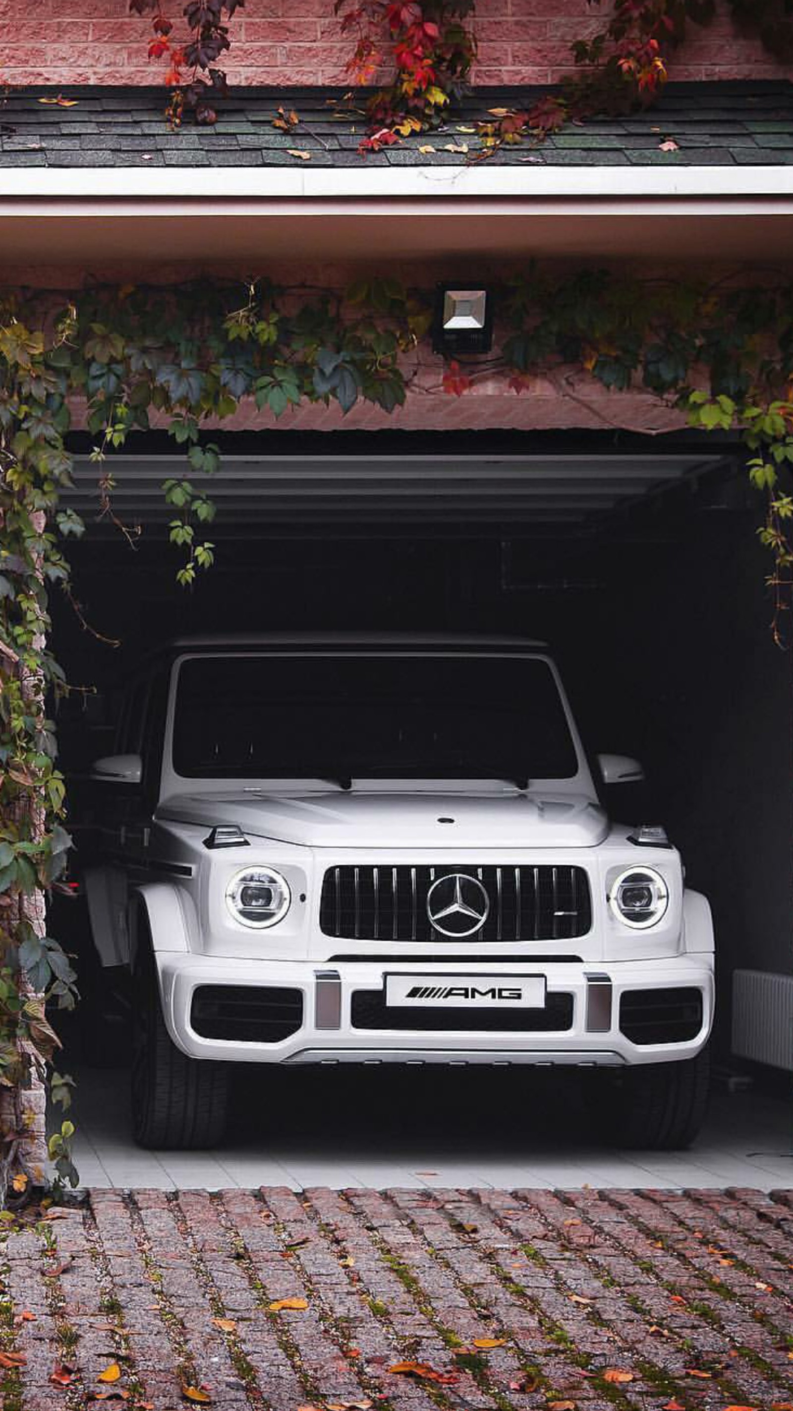 There is a white mercedes suv parked in a garage (mercedes, amg, white, car, supercar)