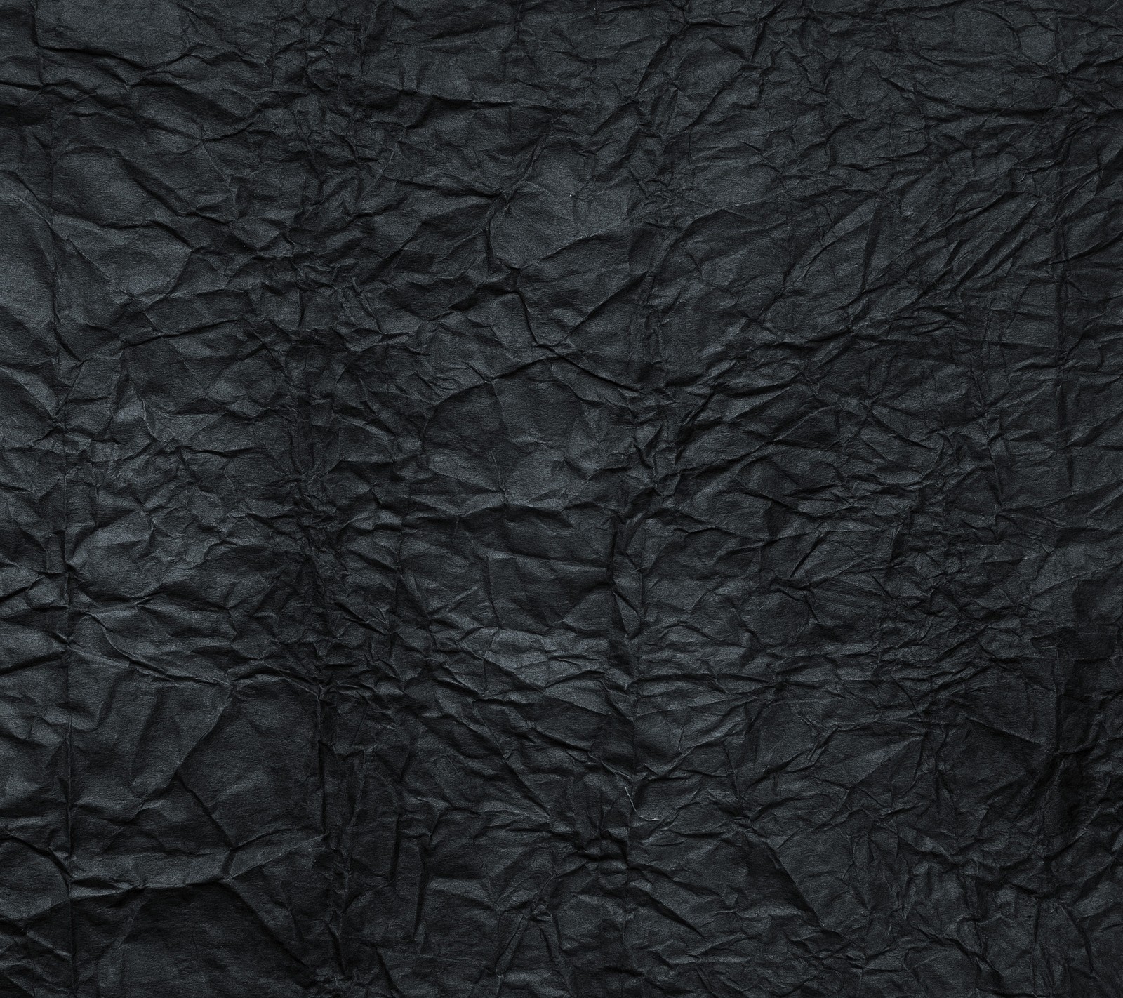 Un primer plano de un fondo de papel negro arrugado con un borde blanco (abstracto, negro, hd, papel, patrón)