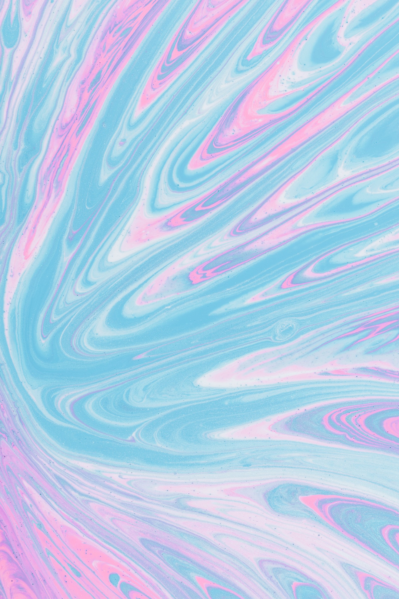 A close up of a colorful marbled surface with a pink and blue swirl (acrylic paint, texture, art, visual arts, aqua)