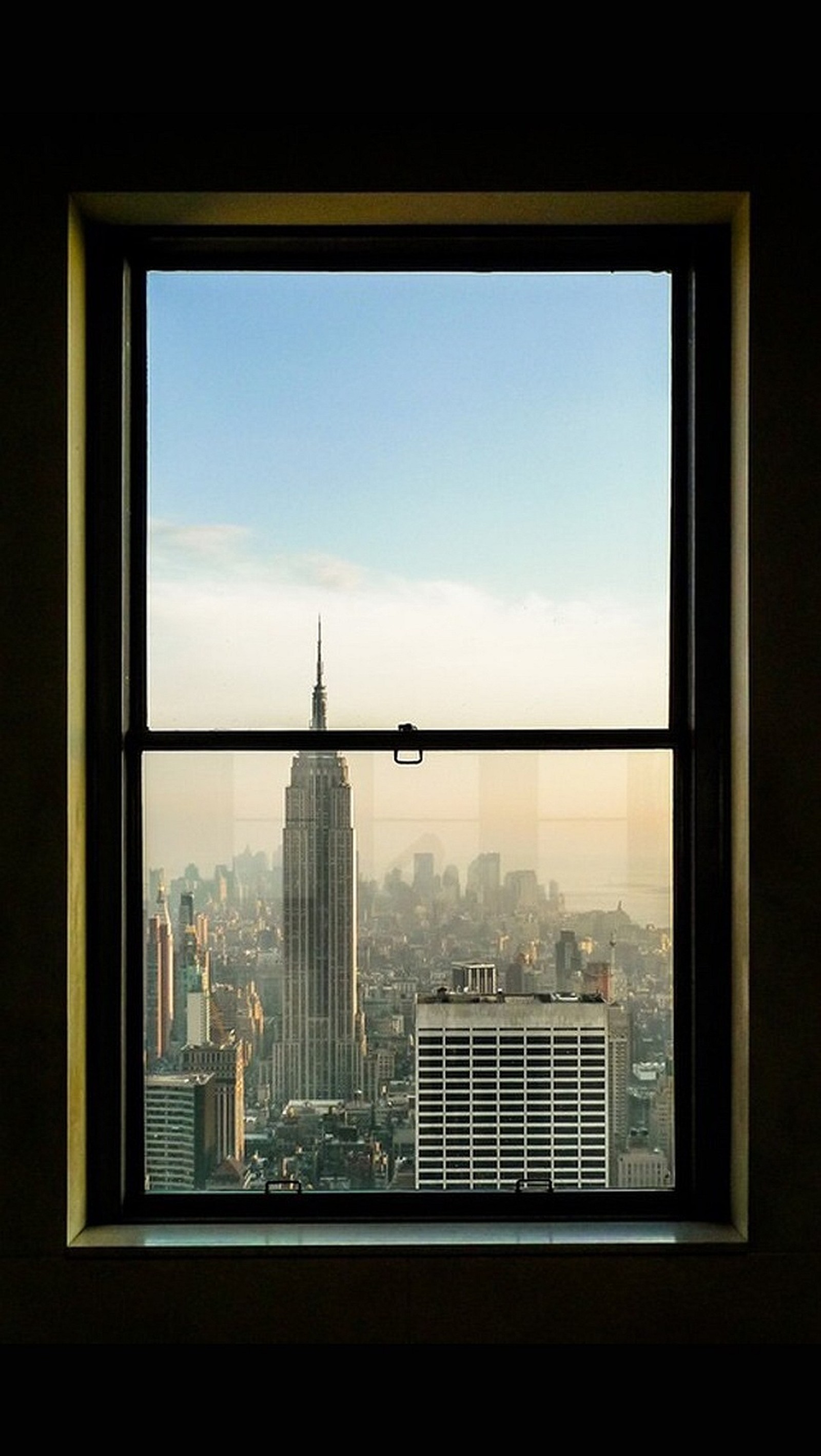 Vue aérienne d'une ville depuis une fenêtre avec vue sur la ville (new york, view of)