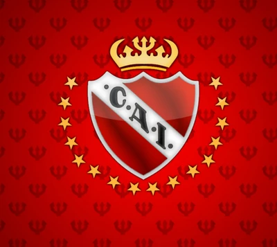 Logo of CAI (Club Atlético Independiente) featuring a red and white shield with a crown, surrounded by gold stars against a red background.