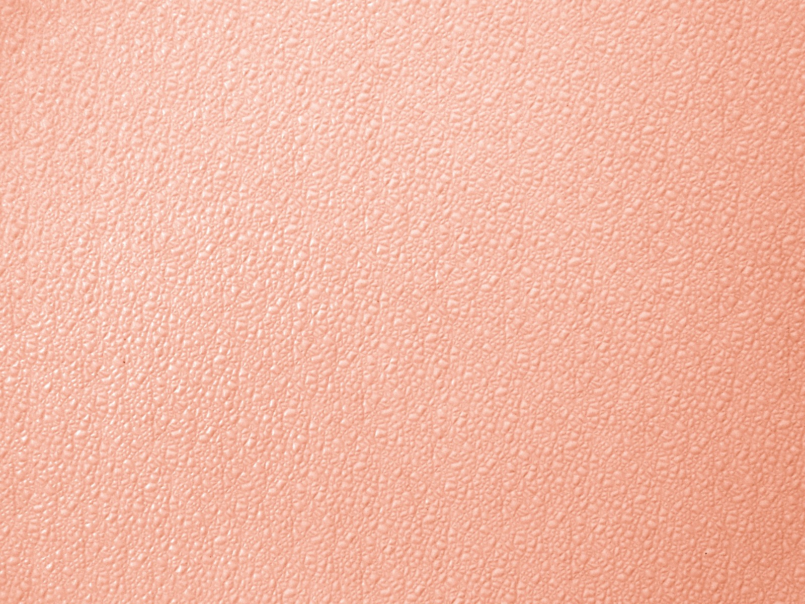 There is a close up of a pink wall with a clock on it (peach, color, pink, beige, lip)