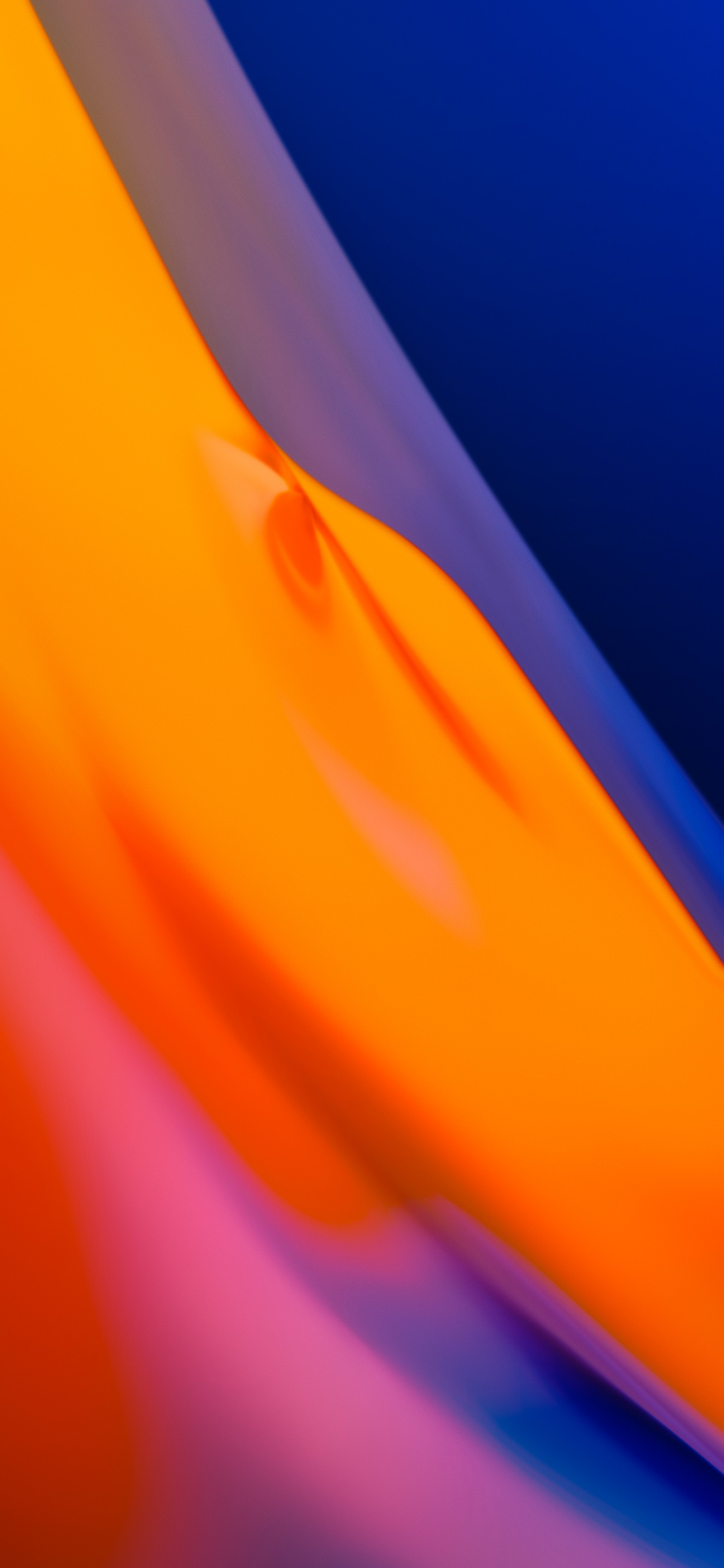 Fotografía abstracta brillante de una superficie curvada con un fondo borroso (oneplus 7 pro, colorido, ámbar, iluminación automotriz, naranja)