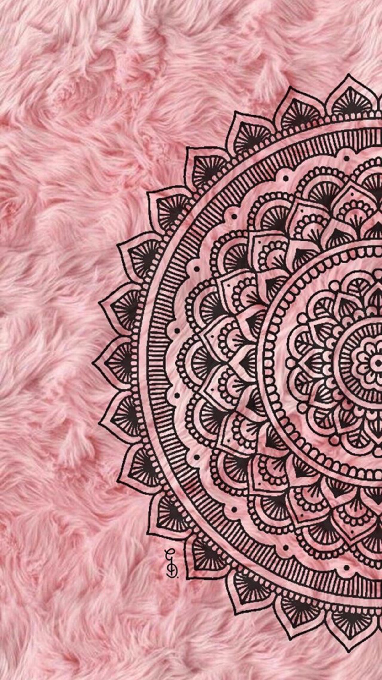 A close up of a pink rug with a black and white design (cute, design, fur, mandala, pink)