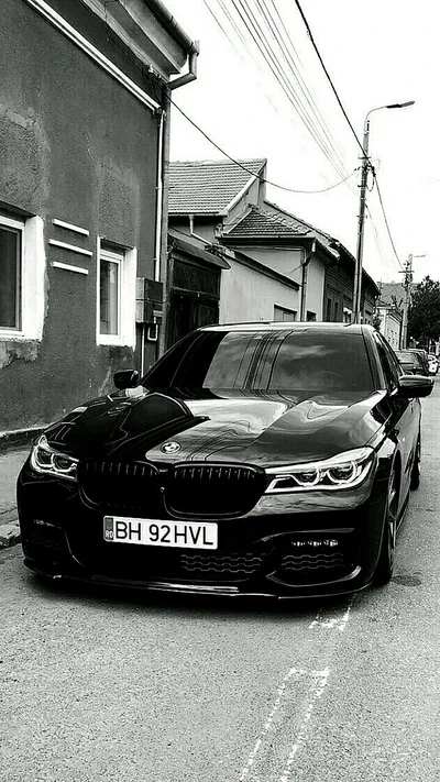 Sleek Black BMW Parked in Urban Setting