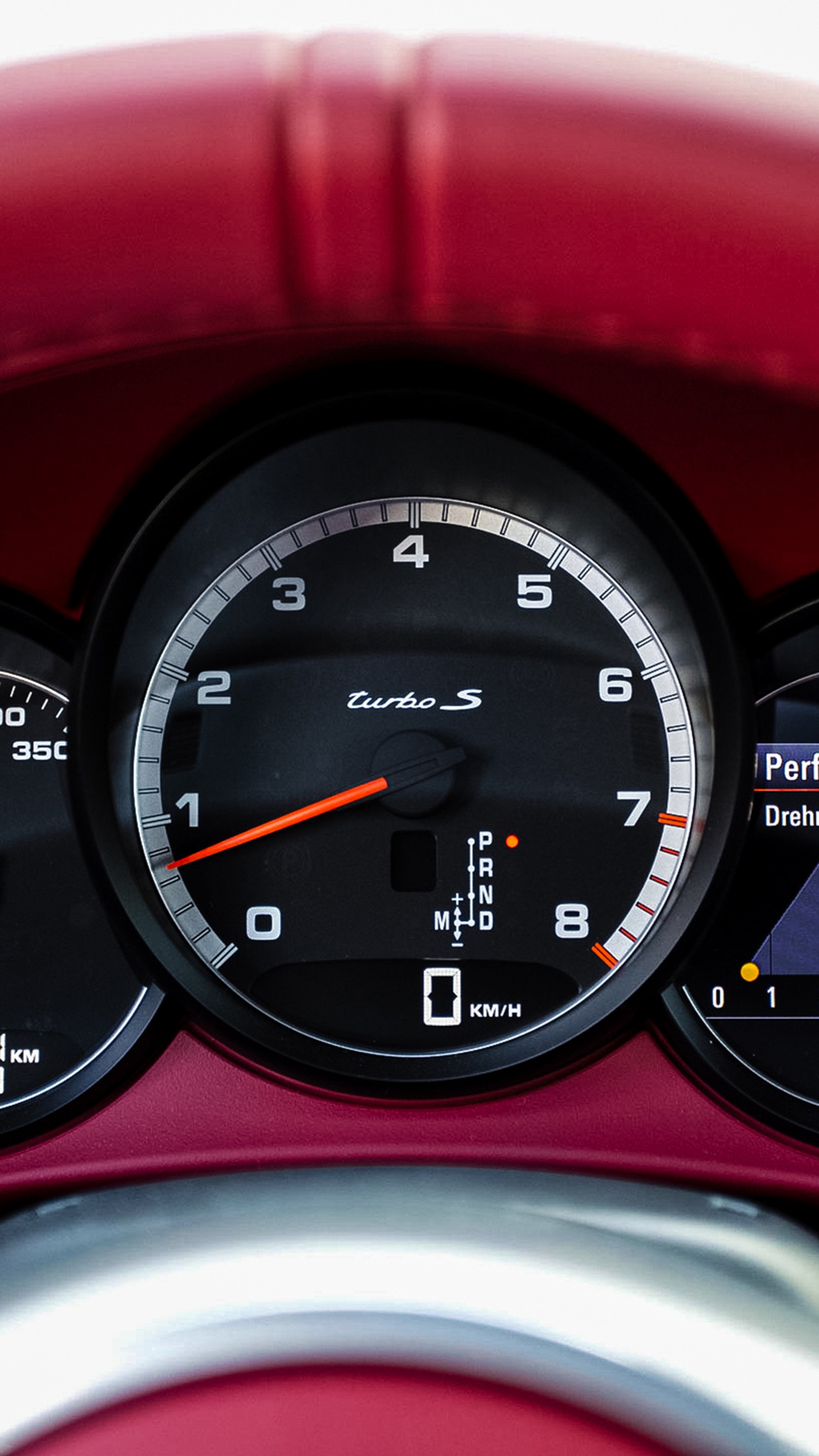 A close up of a car dashboard with a speedometer and gauges (auto, car, porsche, rpm)