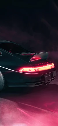 Sleek Black Sports Car with Striking Rear Lighting