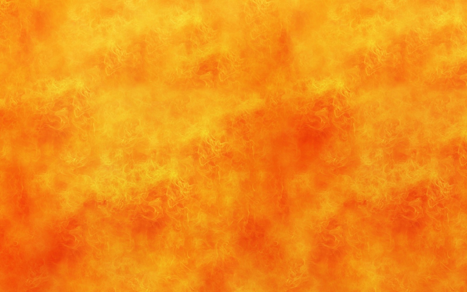 Gros plan d'un fond jaune et orange avec beaucoup de taches (orange, jaune, atmosphère, flamme)