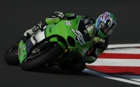 Carreras dinámicas de superbikes en la pista: Un ninja verde en acción