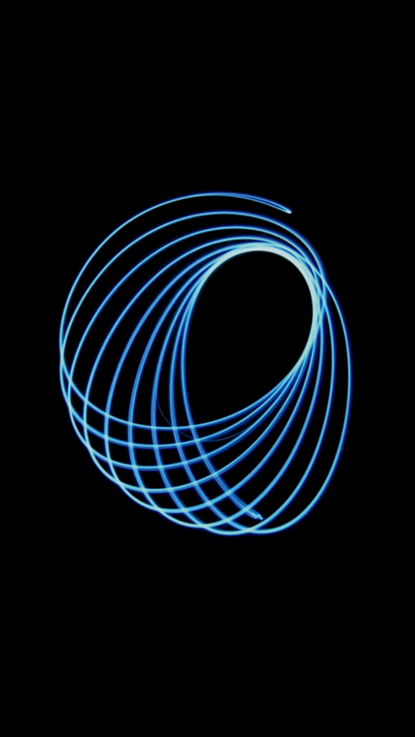 A close up of a blue light painting of a spiral (light, artist, record label, musician, entertainment)