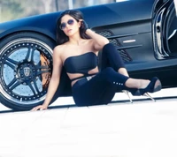 Stylish Model Posing Beside Luxury Car