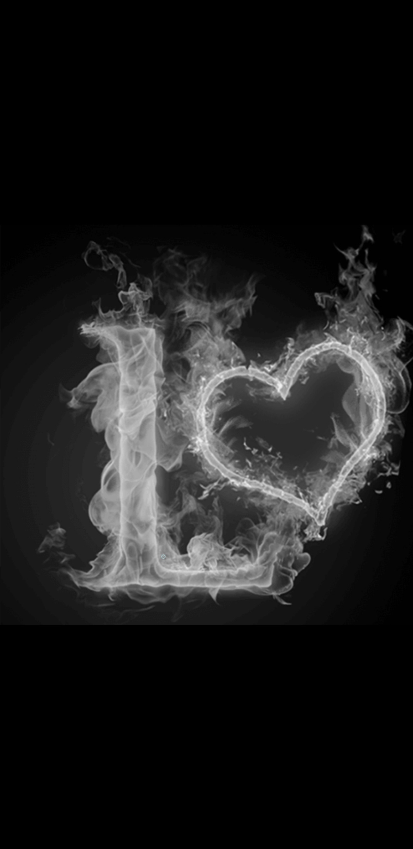 A black and white photo of a heart made out of smoke (smoke, black, letter, letters, alphabets)