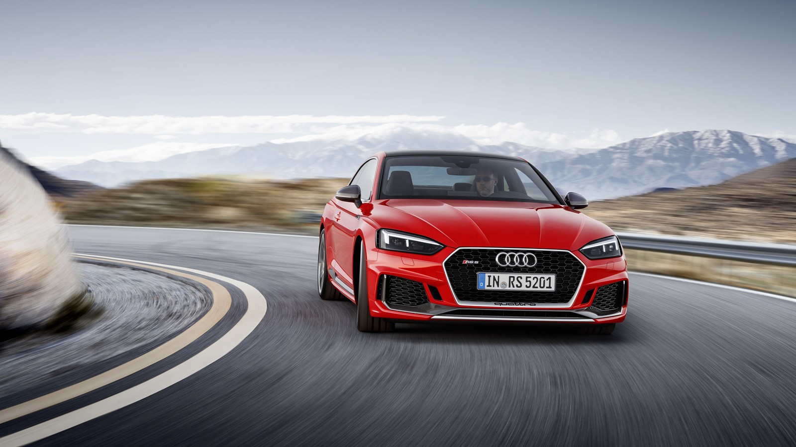 The audi rs3 is driving on a mountain road (audi s5, car, audi, sports car, audi a5)