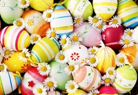 Colorful Easter eggs adorned with daisies, celebrating the joy of the holiday.