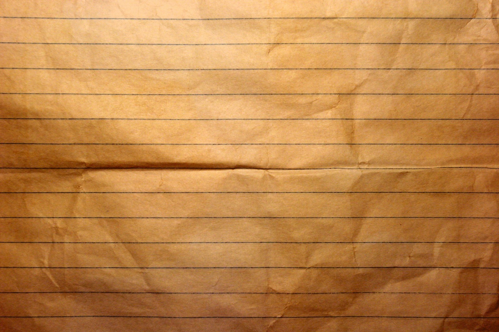 A close up of a piece of paper with a line on it (brown, wood, angle, line, plywood)