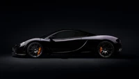 McLaren P1 in Sleek Black against Dark Background - 4K Wallpaper