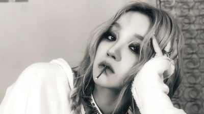 Yuqi from (G)I-DLE in a striking monochrome teaser for the 'I Never Die' album