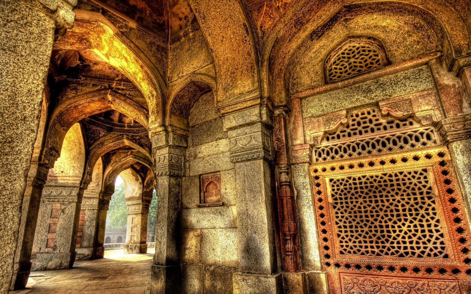 A close up of a building with a lot of windows and a door (india, arch, building, byzantine architecture, medieval architecture)