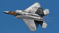 F-22 Raptor: Advanced Military Fighter Aircraft in Flight