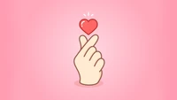 Finger Heart on Pink Background: A Symbol of Love