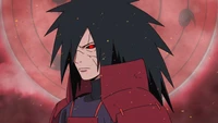 Madara Uchiha with Sharingan against a red background in a dramatic anime scene.