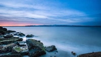 Tranquil Coastal Evening by the Ocean Horizon