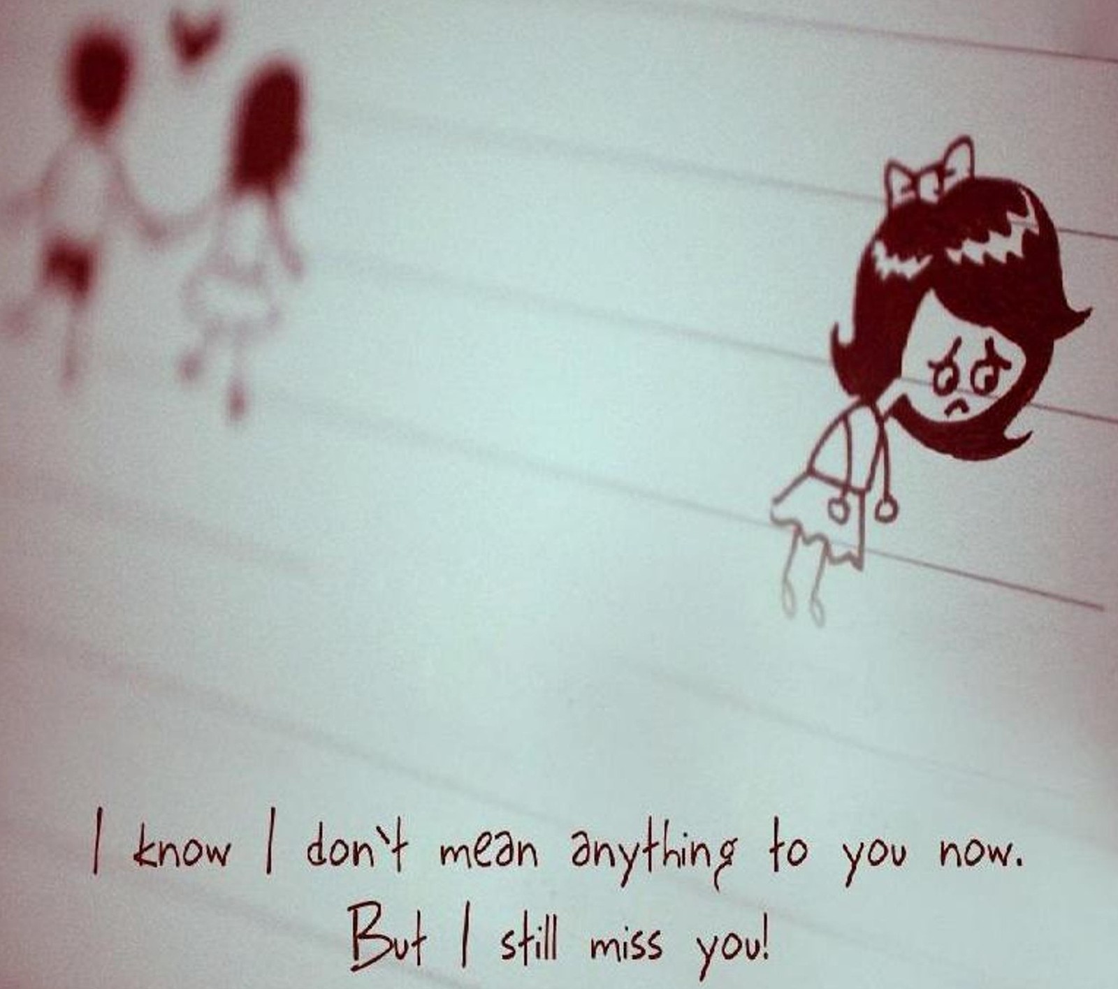 Someone wrote a note with a drawing of a girl and a boy (heart, hurt, love, miss you, sad)