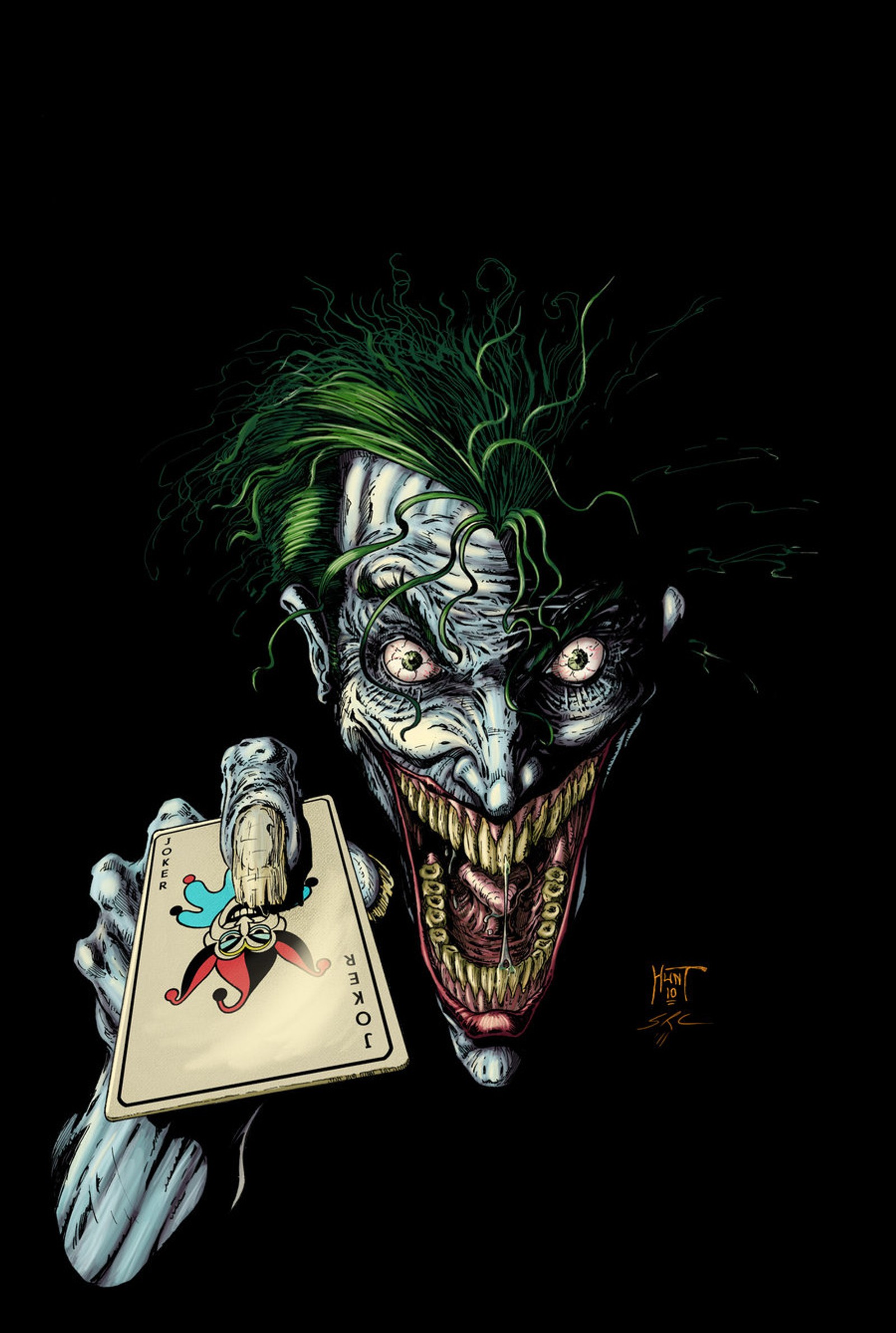 Joker holding a playing card with a joker face on it (batman, comics, dc, joker, villans)