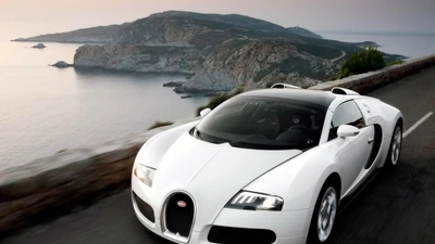 Элегантный Bugatti Veyron Roadster на живописной прибрежной дороге