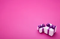 Elegant Gift Boxes in Pink and Purple on a Vibrant Background