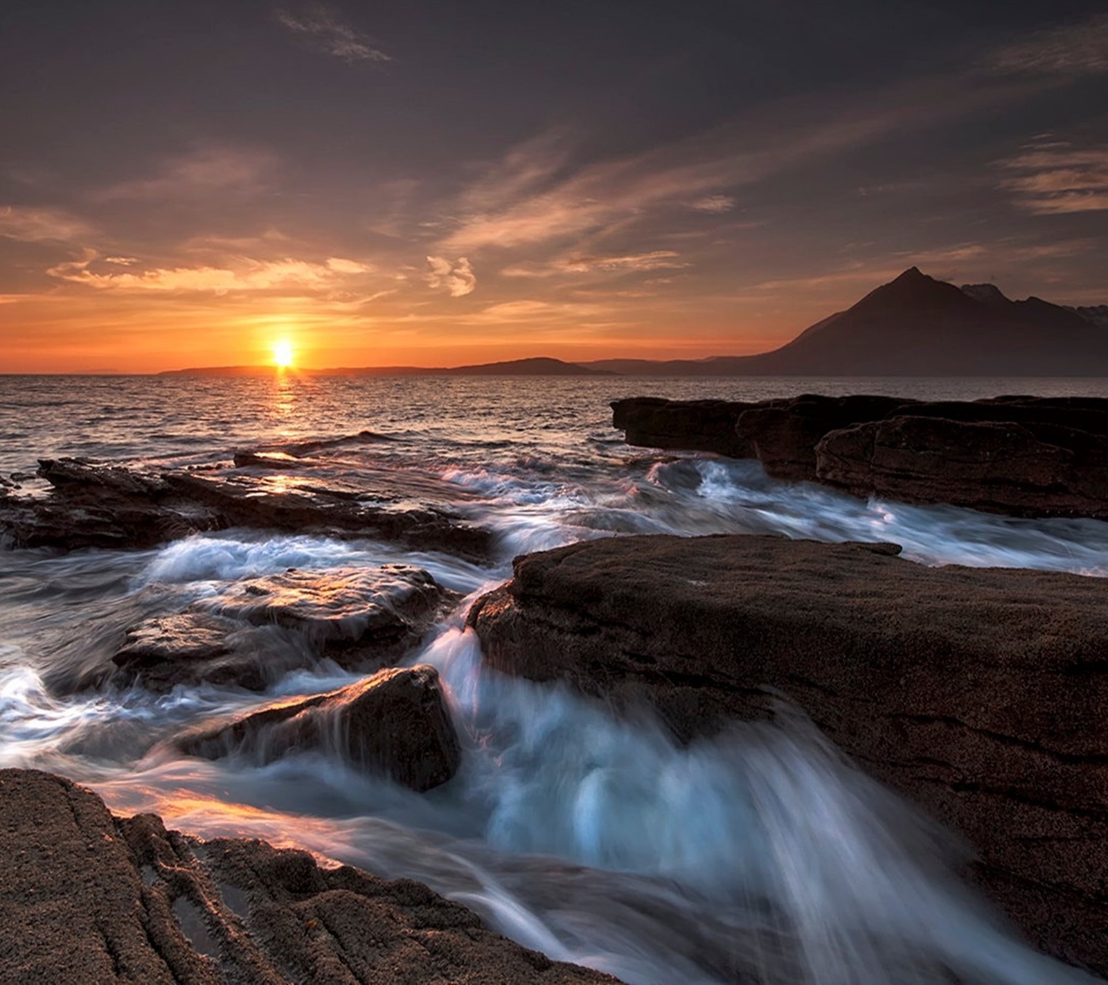 Arafed view of a sunset over the ocean with waves crashing (landscape, nature)