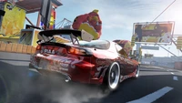 Une voiture de sport personnalisée dérive sur une piste de course vibrante dans "Need for Speed ProStreet", mettant en avant des caractéristiques de haute performance et un gameplay dynamique.