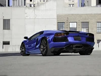 Lamborghini Aventador S in striking blue, showcasing sleek automotive design against a modern urban backdrop.