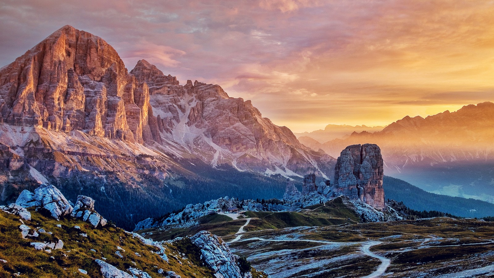 A view of a mountain range with a trail going through it (mountains, cinque torri, italy, scenery, sunlight)